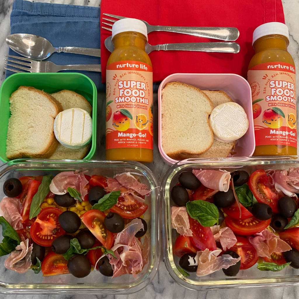 kids' lunchbox idea on Teuko.com with fresh summer salads, bread and mini brie, and yummy Super Food "Mango-Go!" NurtureLife Smoothies