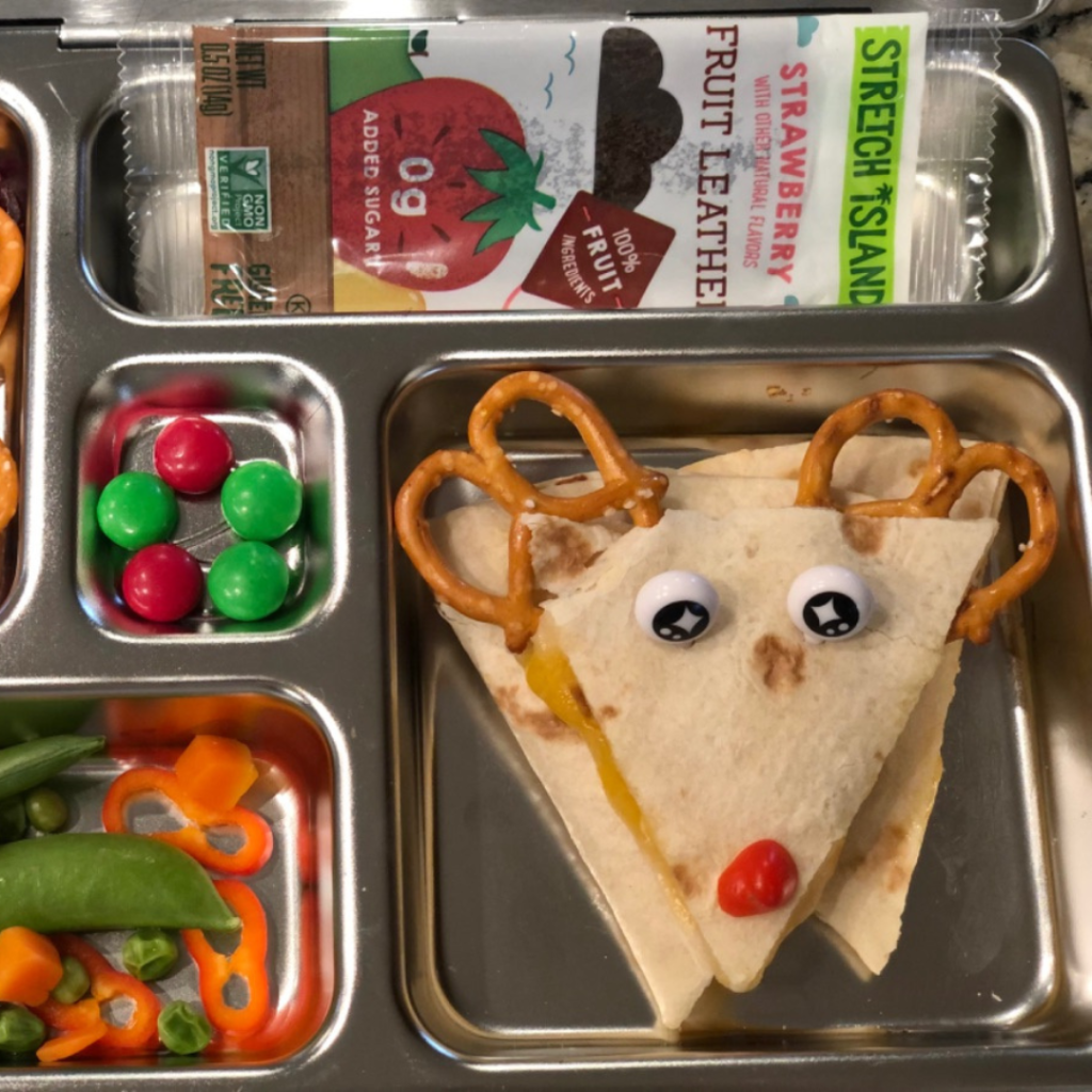 Easy, quick, and cute lunchbox idea for kids featuring the most famous reindeer of all, Rudolph the Red Nose Reindeer,
