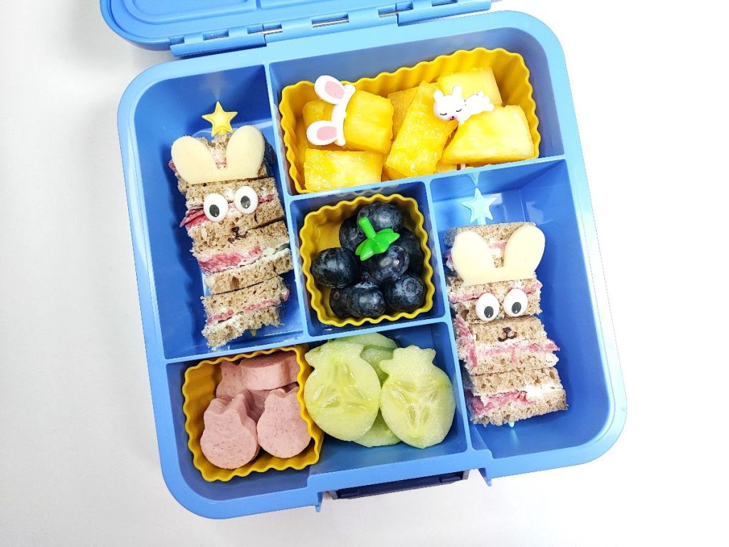 Easter bunny sandwich sticls in a square lunch box for kids